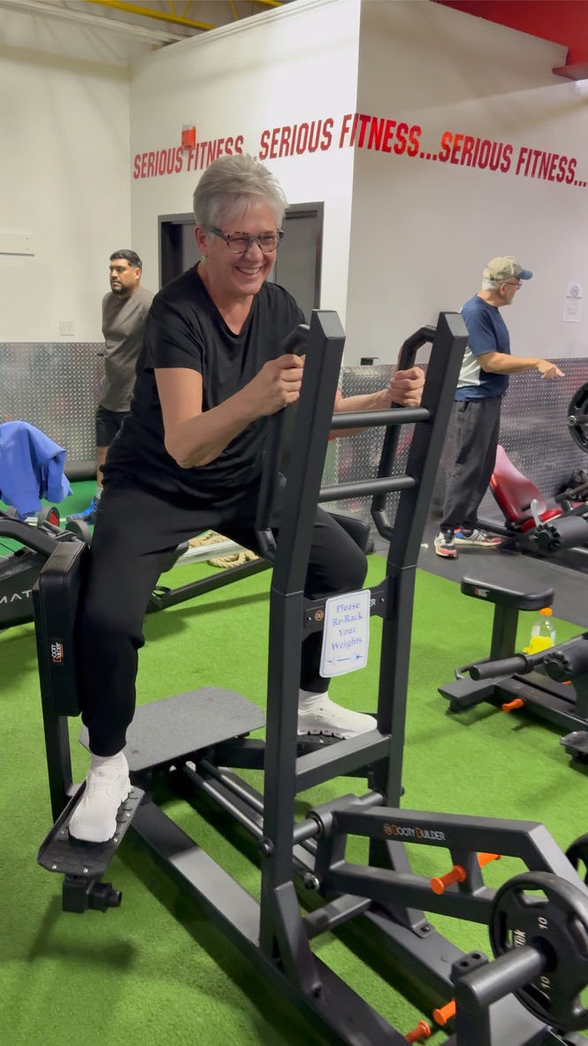 Member using Booty Builder machine